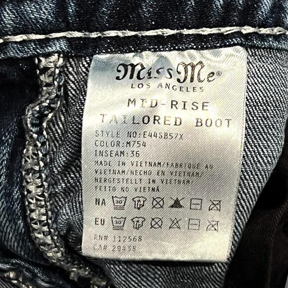 โ
Miss Me Signature Taylored Boot Cut Rhinestone - Studded Design Denim Jeans โ
- Picture 7 of 8